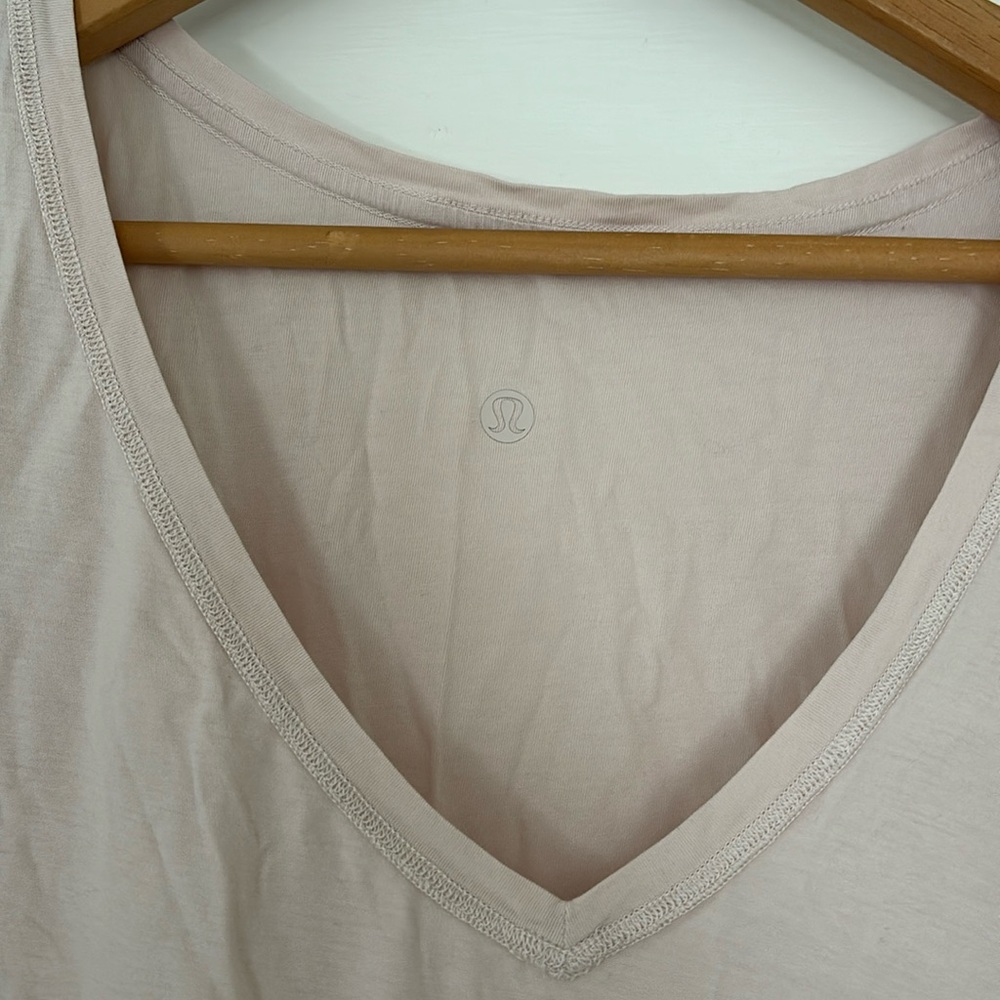 Pink Lululemon v-neck tee shirt